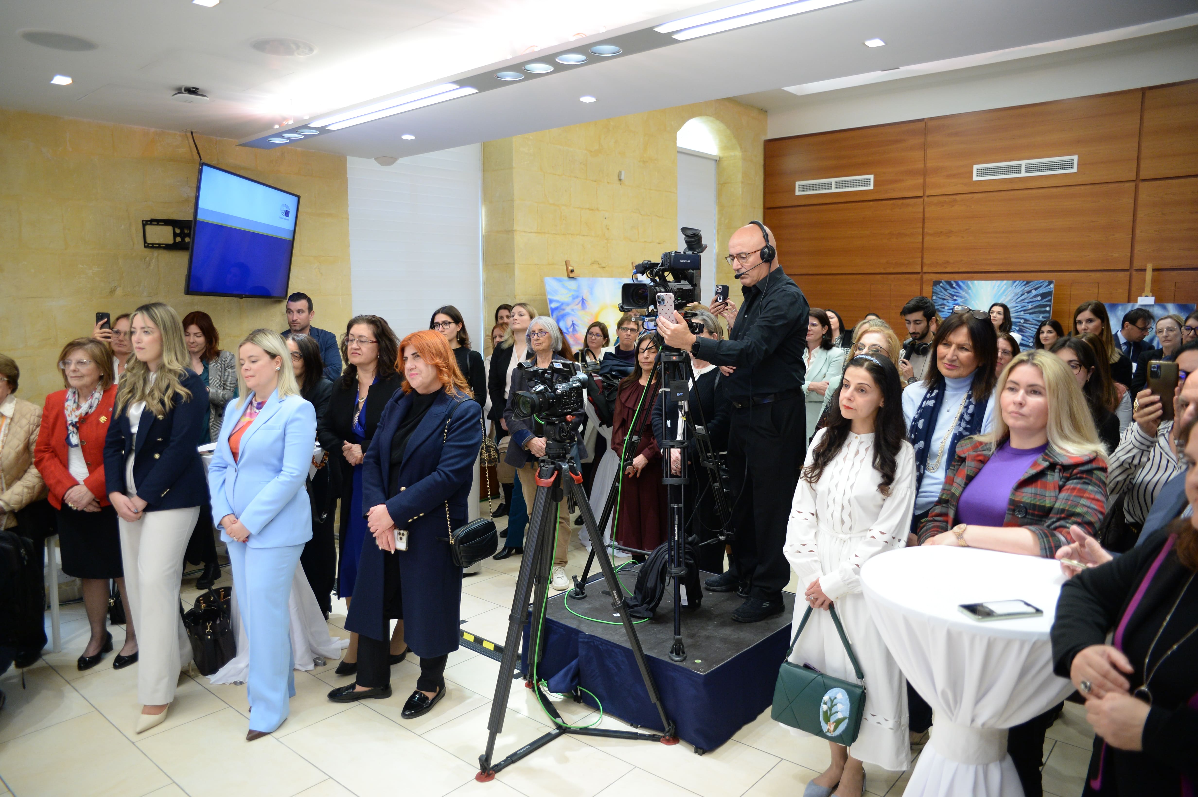 The crowd of female invitees at the International Women's Day event at Europe House